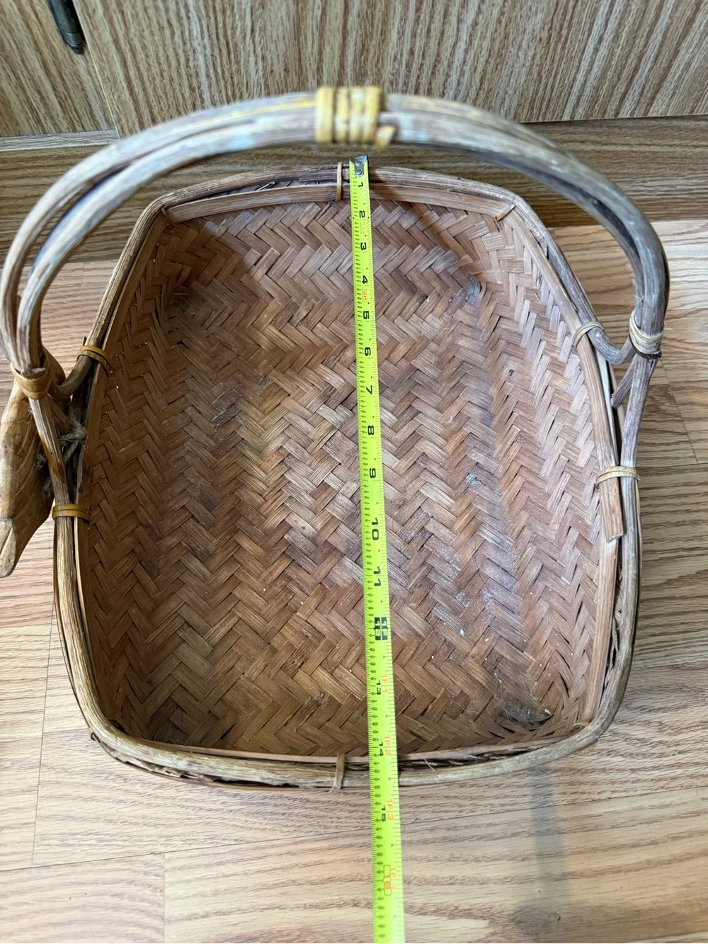 Vintage Zhejiang Chinese woven rattan and wood handled basket with a carved